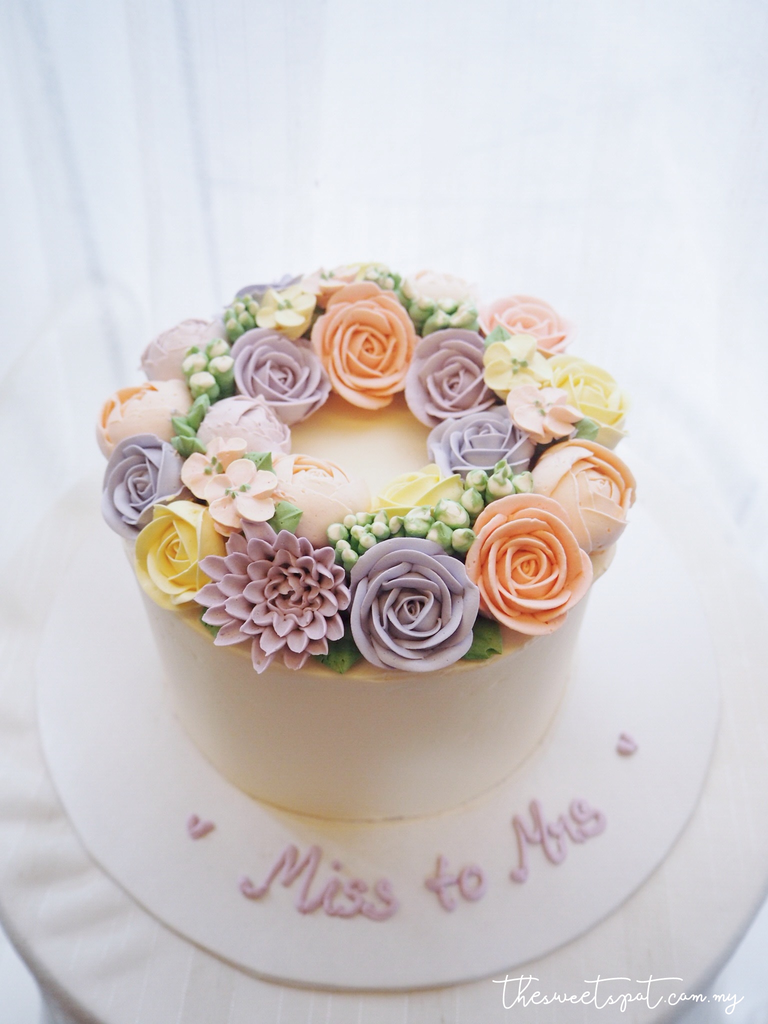 Mix pastel buttercream flower cake
