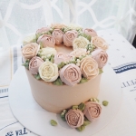 Warm brown and pale pink buttercream cake 6"